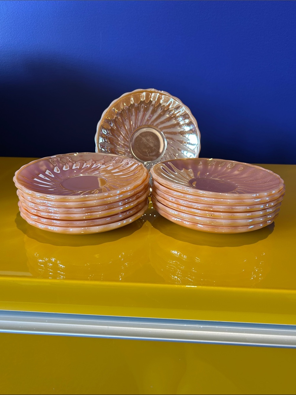 Fire King Peach Lustre plates in Swirl Pattern